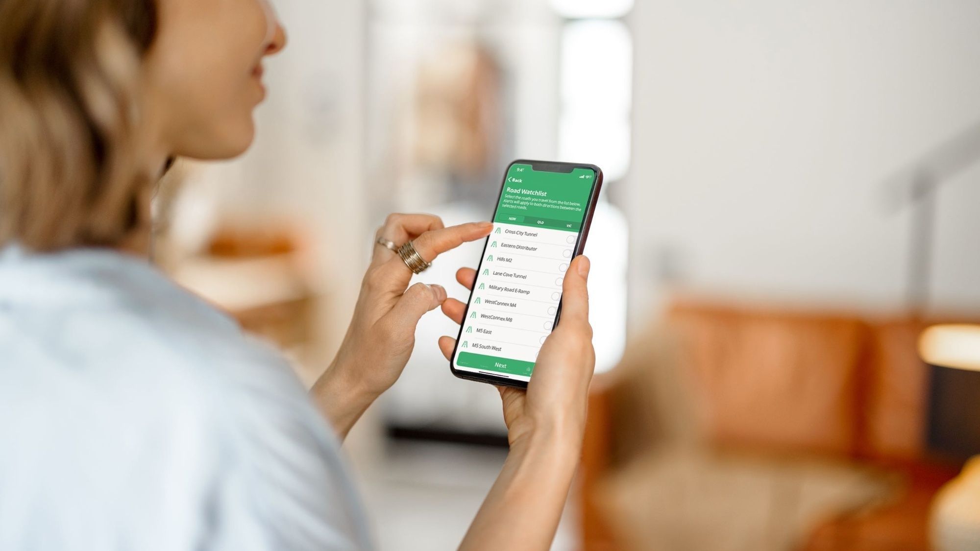 A person holding a phone screen